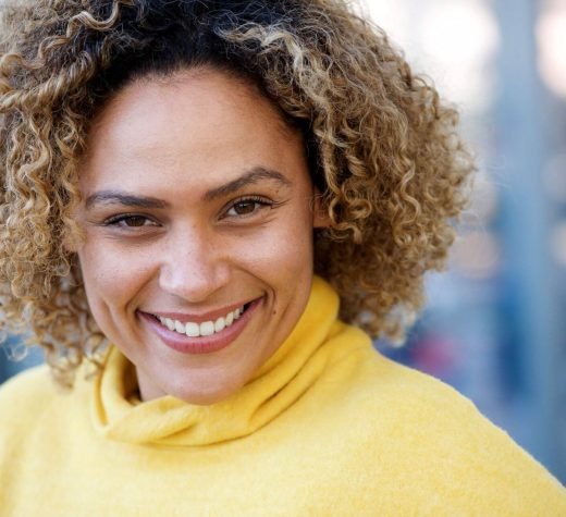 close-up-happy-african-american-woman-with-curly-h-2024-10-18-05-38-58-utc.jpg